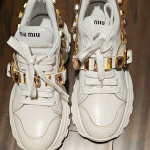 Miu Miu White Sneakers with Gold Accents